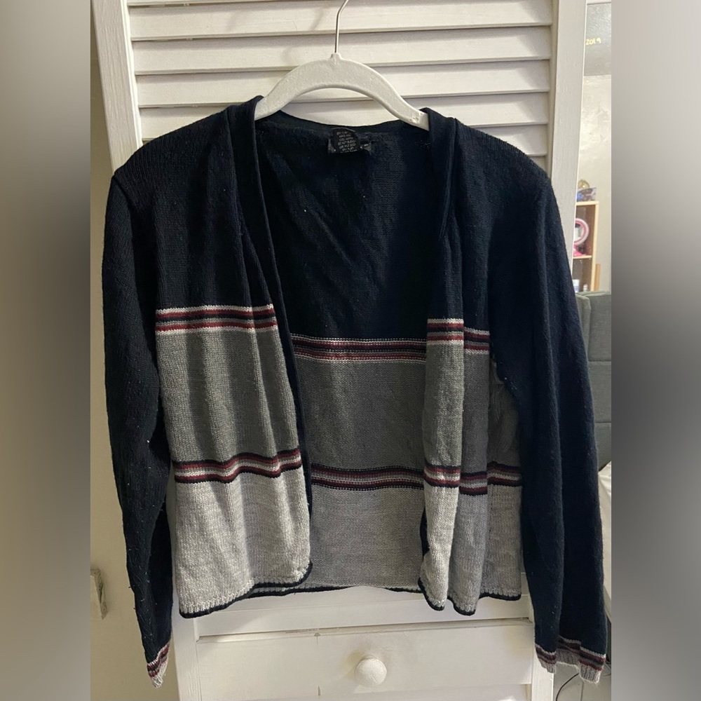 Blue and gray sweater with red stripes